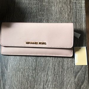 Michael Kora Jet Set Travel leather Flat Wallet